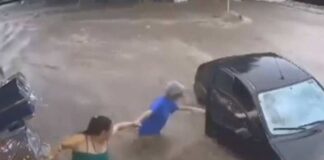 VÍDEO: Mulher e sobrinha são resgatadas de enxurrada por “corrente humana” em SP