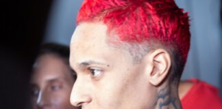 Oruam se entrega à polícia após mandado de prisão