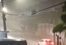 Muro de condomínio desaba durante temporal no bairro Flores e interdita rua em Manaus